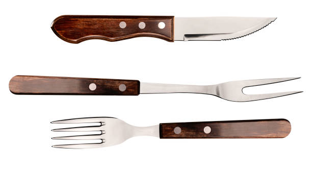 istock Steak fork and knife on a white background. 1286168703