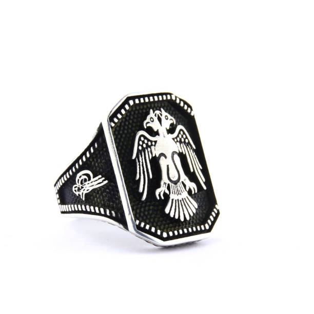 istock Stone-embroidered silver ring for men on a white background 1286171167