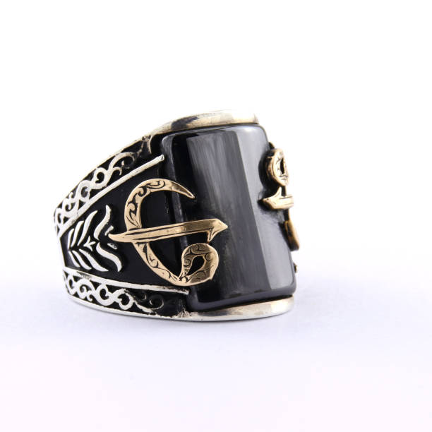 istock Stone-embroidered silver ring for men on a white background 1286171239