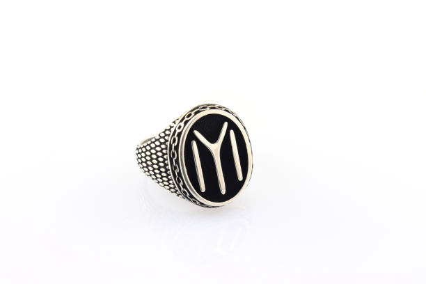 istock Stone-embroidered silver ring for men on a white background 1286173181