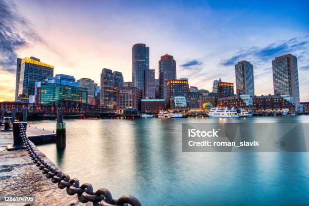 Boston Skyline With Financial District And Boston Harbor At Sunset Usa Stock Photo - Download Image Now