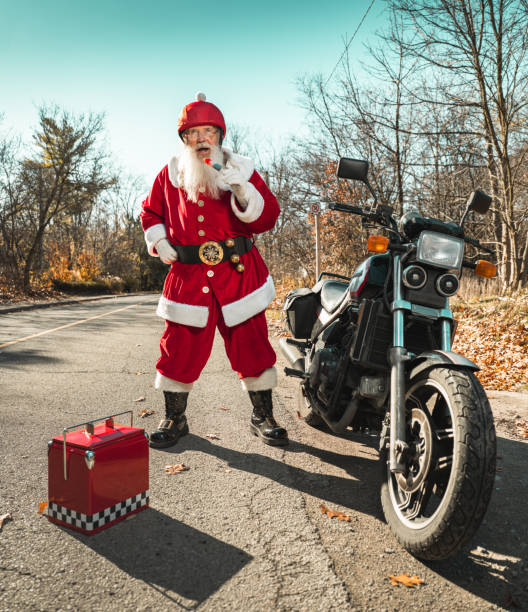 istock Santa Claus taking a break on the road 1286175406