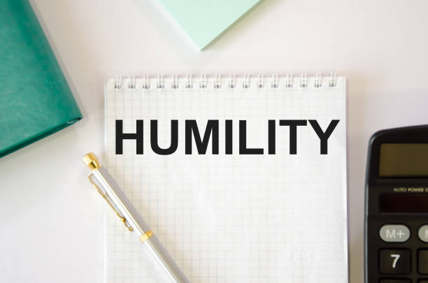 istock The word humility is written on a white notepad. around the notepad lie notepad, sticker, calculator 1286176611