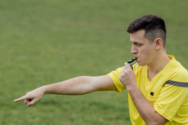istock Referee showing on penalty while gaming. Concept of sport, rules violation, controversial issues, obstacles overcoming. 1286178354