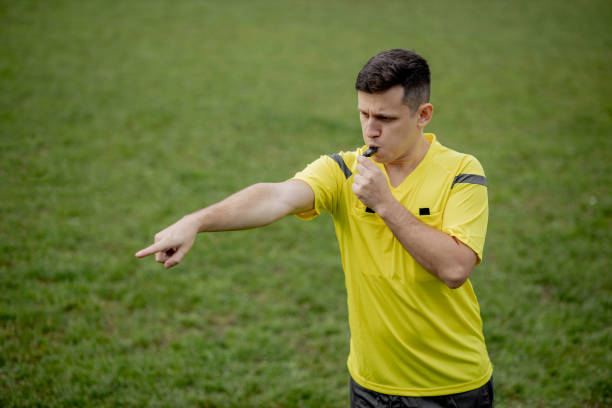 istock Referee showing on penalty while gaming. Concept of sport, rules violation, controversial issues, obstacles overcoming. 1286178427