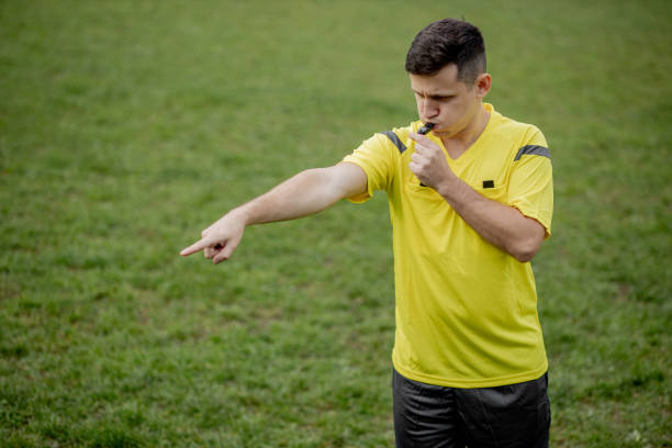 istock Referee showing on penalty while gaming. Concept of sport, rules violation, controversial issues, obstacles overcoming. 1286178429
