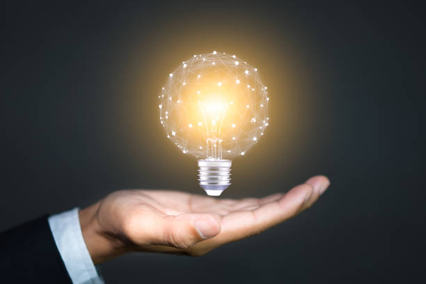 istock Innovative, solution and new idea concepts with Light bulb in hand of businessman 1286178748