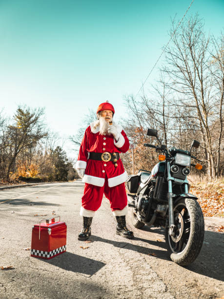 istock Santa Claus taking a break on the road 1286178874