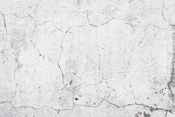 istock Old cracked concrete wall texture. Weathered background. 1286182166