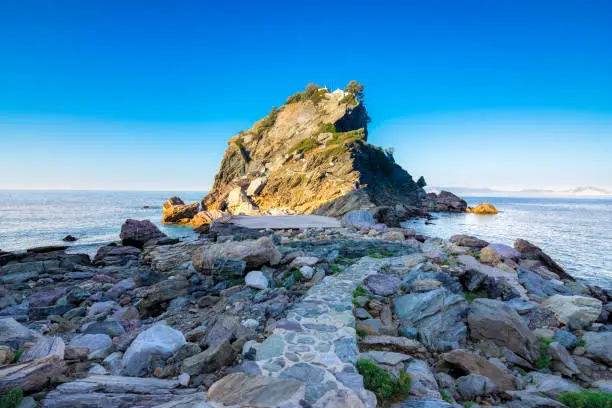 The famous rock Kastri with the small church Agios Ioannis in Skopelos, Sporades, Greece