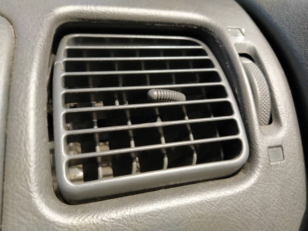 istock ventilation grill in the passenger compartment. Gray car interior. Car engine grill with rust 1286184211