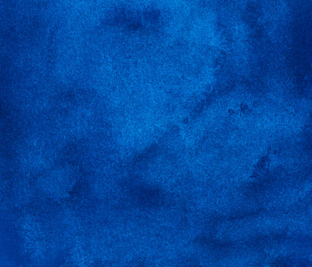 istock Watercolor deep blue background texture. Hand painted watercolour backdrop. Sky blue stains on paper. 1286186349