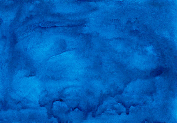 istock Watercolor deep azure blue background texture. Hand painted watercolour backdrop. Sky blue stains on paper. 1286186383