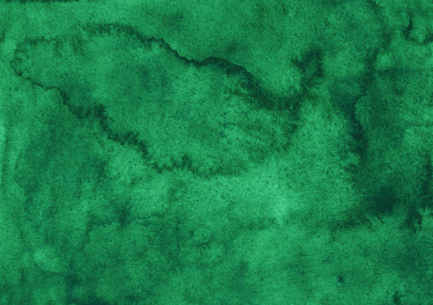 istock Watercolor emerald background texture painting. Watercolour abstract deep green backdrop. Stains on paper. 1286186429