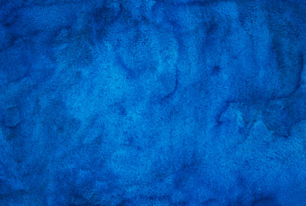 istock Watercolor deep blue liquid background texture. Hand painted watercolour overlay. Sky blue stains on paper. 1286186441