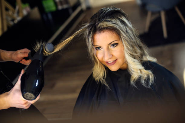 istock Blonde in a hair salon 1286186491