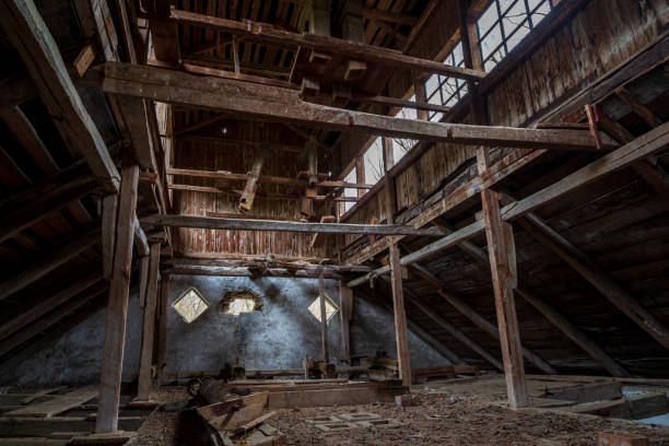 istock Old abandoned water mill in the forest. Abandoned building.
