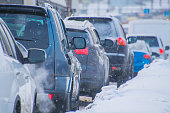 cars in a traffic jam in winter