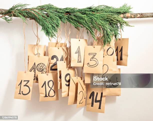 Handmade Advent Calendar Gift Bags Hanging On The Rope Eco Friendly Christmas Gifts Diy Stock Photo - Download Image Now