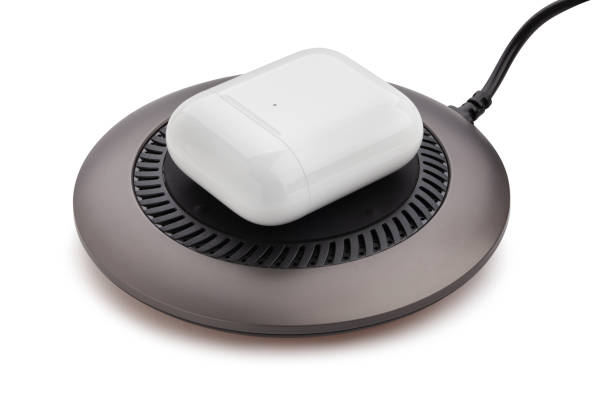 istock wireless charger with airpods charging case on 1286196991