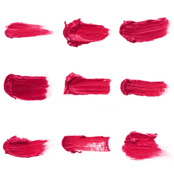 istock Lipstick smear smudge swatch isolated on white background. Cream makeup texture. Bright red color cosmetic product brush stroke swipe sample 1286198047