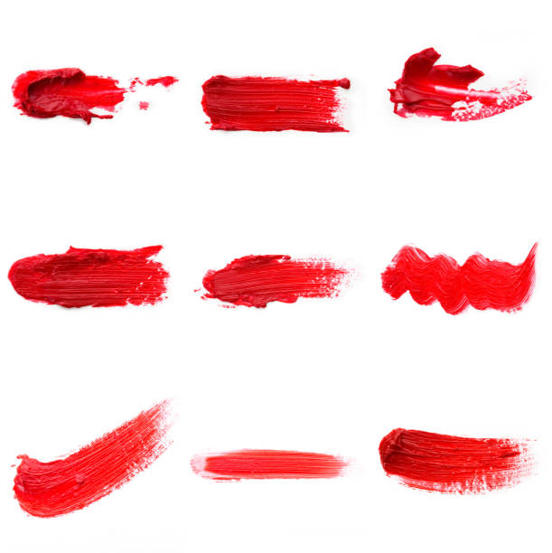 istock Lipstick smear smudge swatch isolated on white background. Cream makeup texture. Bright red color cosmetic product brush stroke swipe sample 1286198049