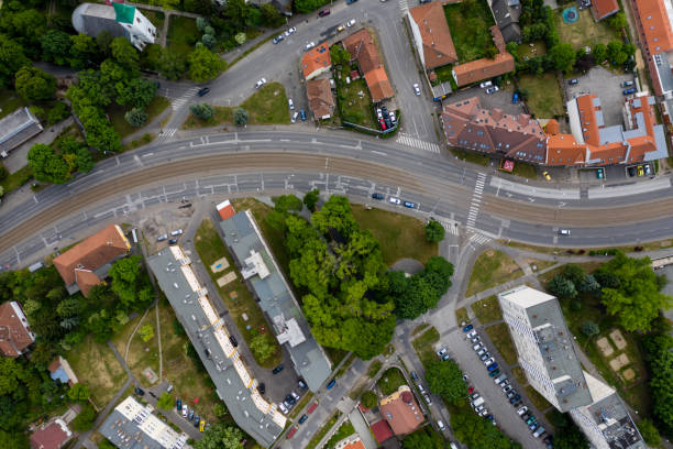 istock Flying over city area 1286198151
