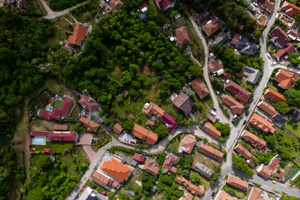 istock Flying over city area 1286198156