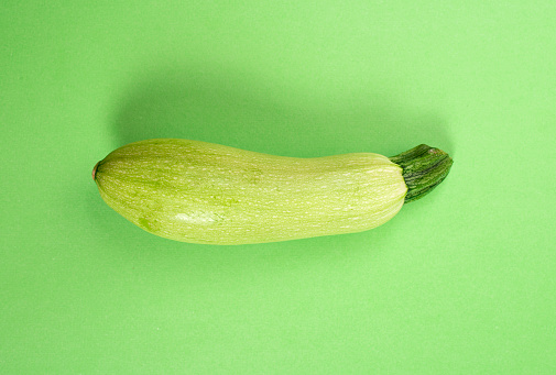 Zucchini On Green Background