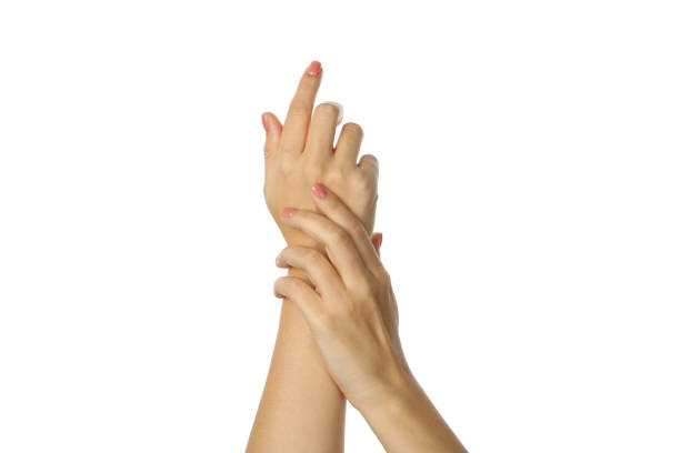 istock Cute female hands with pink manicure isolated on white background 1286201878