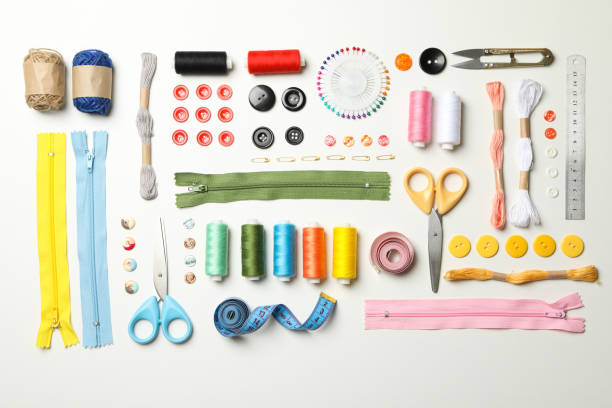 istock Flat lay with sewing supplies on white background 1286202195