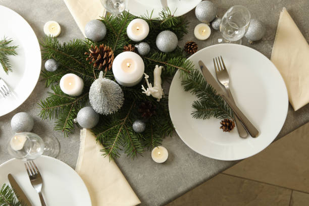 istock Concept of romantic New year table setting on gray table 1286203847