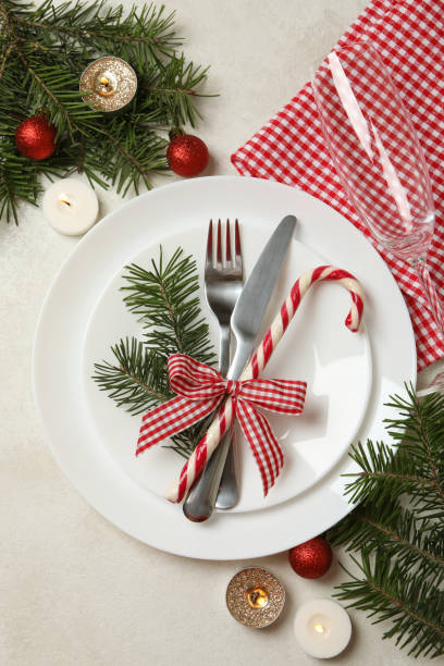 istock Concept of New year table setting with candles on white table 1286204070