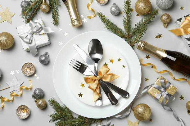 istock Concept of New year table setting on gray background, top view 1286204086