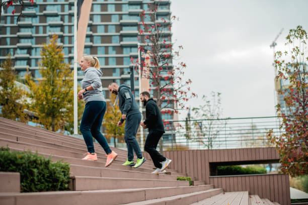 istock Three young friends running on the steps 1286204952