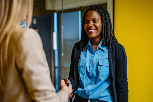 istock Two people handshake on business meeting 1286208960