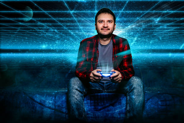 istock Man playing video games at night 1286210319