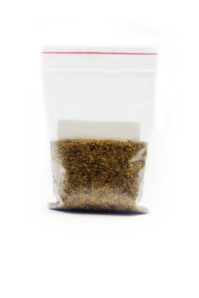 istock Alfalfa seeds for germination in  bag isolated on a white background. 1286215110