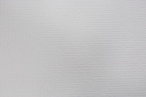 Texture of cotton watercolor paper for artwork. Modern background, backdrop, substrate, composition use with copy space