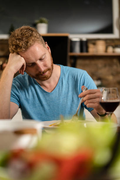 istock Depressed young man having no appetite to eat. 1286216133
