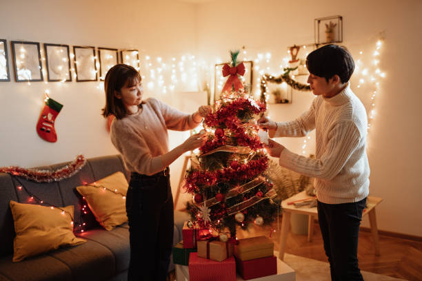 istock Japanese couple at home for Christmas during quarantine 1286217181