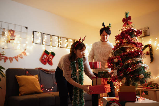 istock Japanese couple at home for Christmas 1286217411