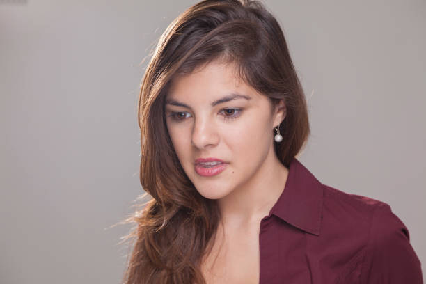 istock Beautiful young lady poses for camera. 1286221319