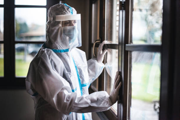 istock virologist at the window looking away 1286224127