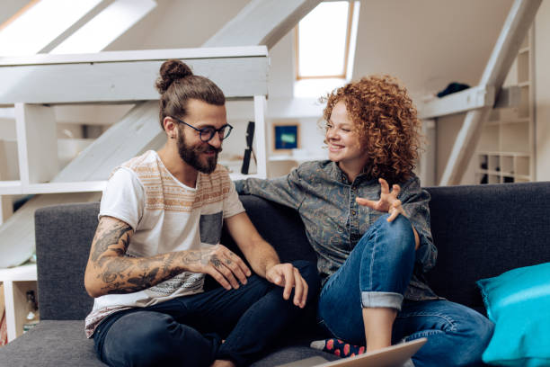istock Young couple watching something online and having fun 1286224385