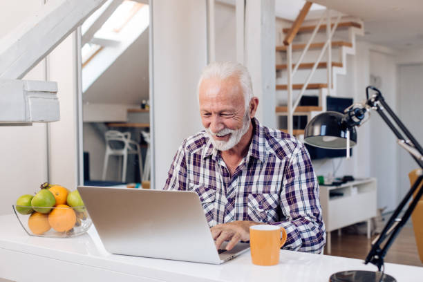 istock Senior man freelancing from home 1286225190