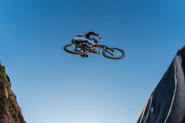 istock MTB Bike jump over a dirt trail 1286225193