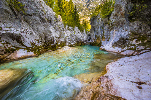 Blue Colored Soca river in Triglav National Park, Julian Alps, Slovenia Europe