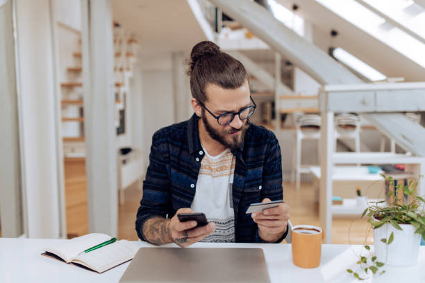 istock Young man checking his bank account online 1286225291