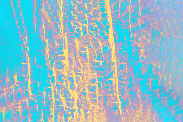 istock Vivid turquoise, pink, yellow patchy background with wood texture 1286227853